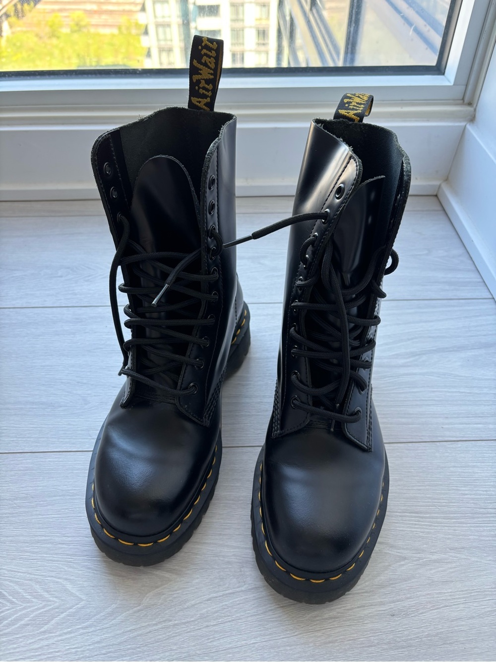 Dr. Martens Black Leather Combat Boots with Yellow Stitching